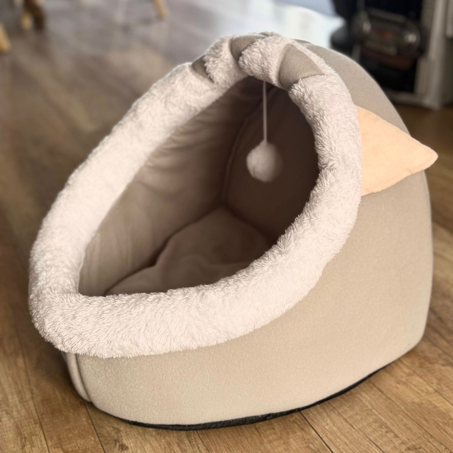 Cat house with a pillow and a toy, a soft sleeping place
